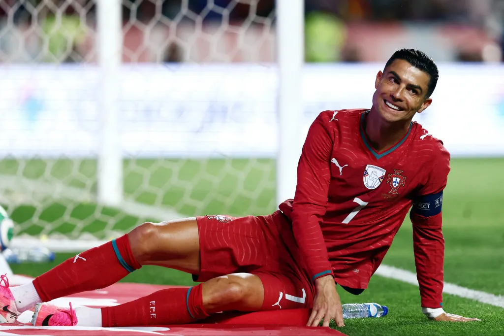 Portugal's Cristiano Ronaldo reacts on the ground
