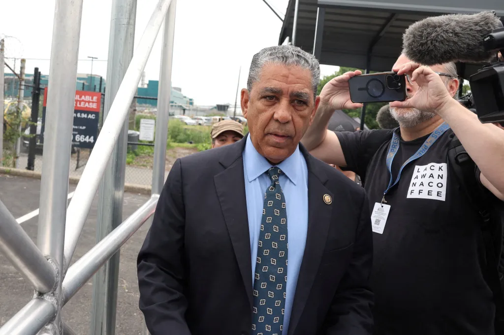 U.S. Congressman Adriano Espaillat attempts to enter Delaney Hall in Newark, New Jersey.