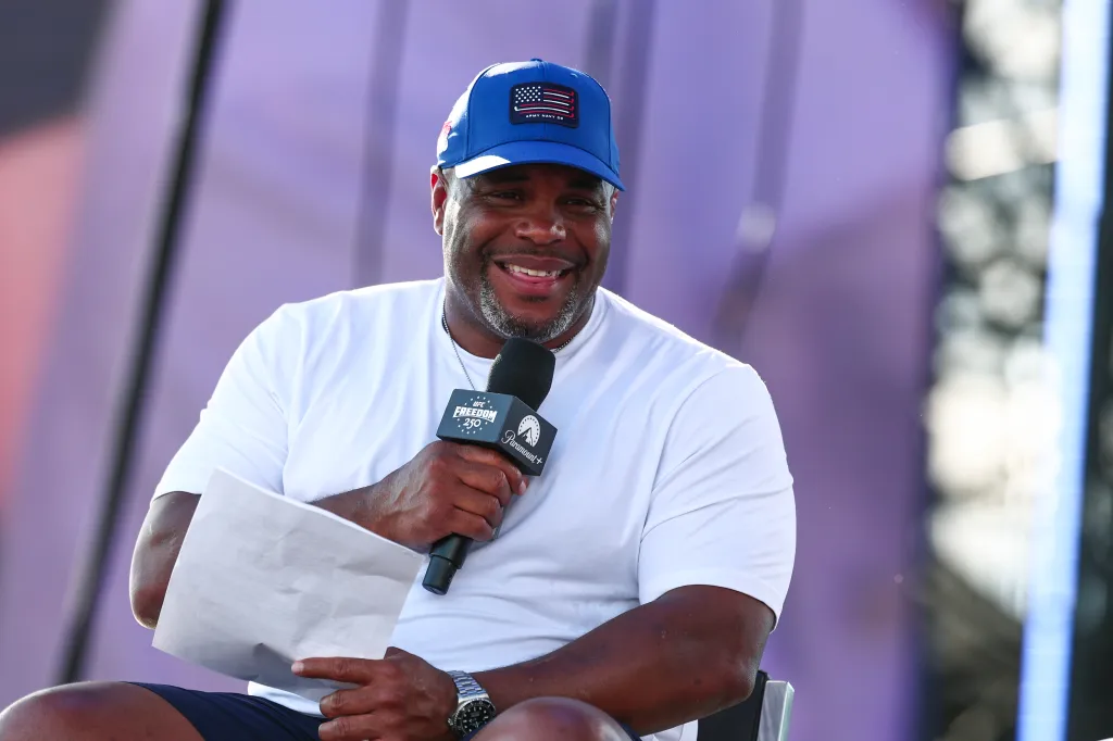 Daniel Cormier hosts the UFC + WWE Panel.