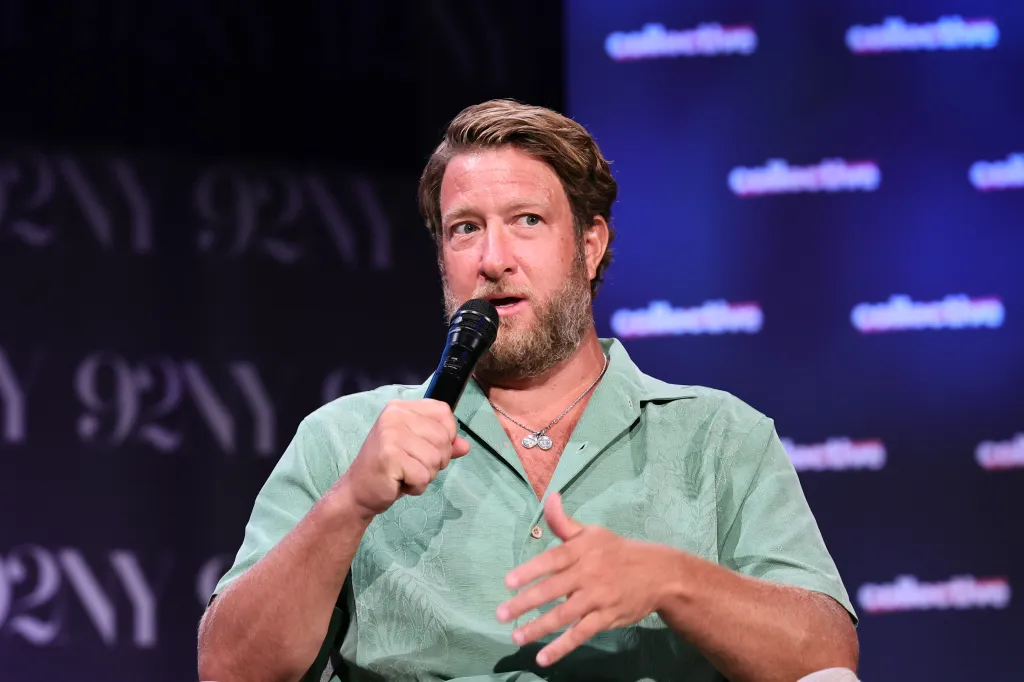 Dave Portnoy speaking into a microphone.