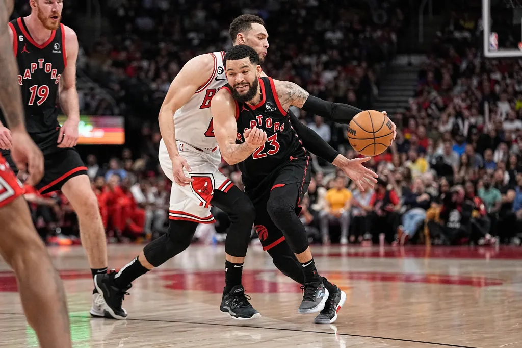 Toronto Raptors guard Fred VanVleet (23) drives to the basket against Chicago Bulls guard Zach LaVine (8).