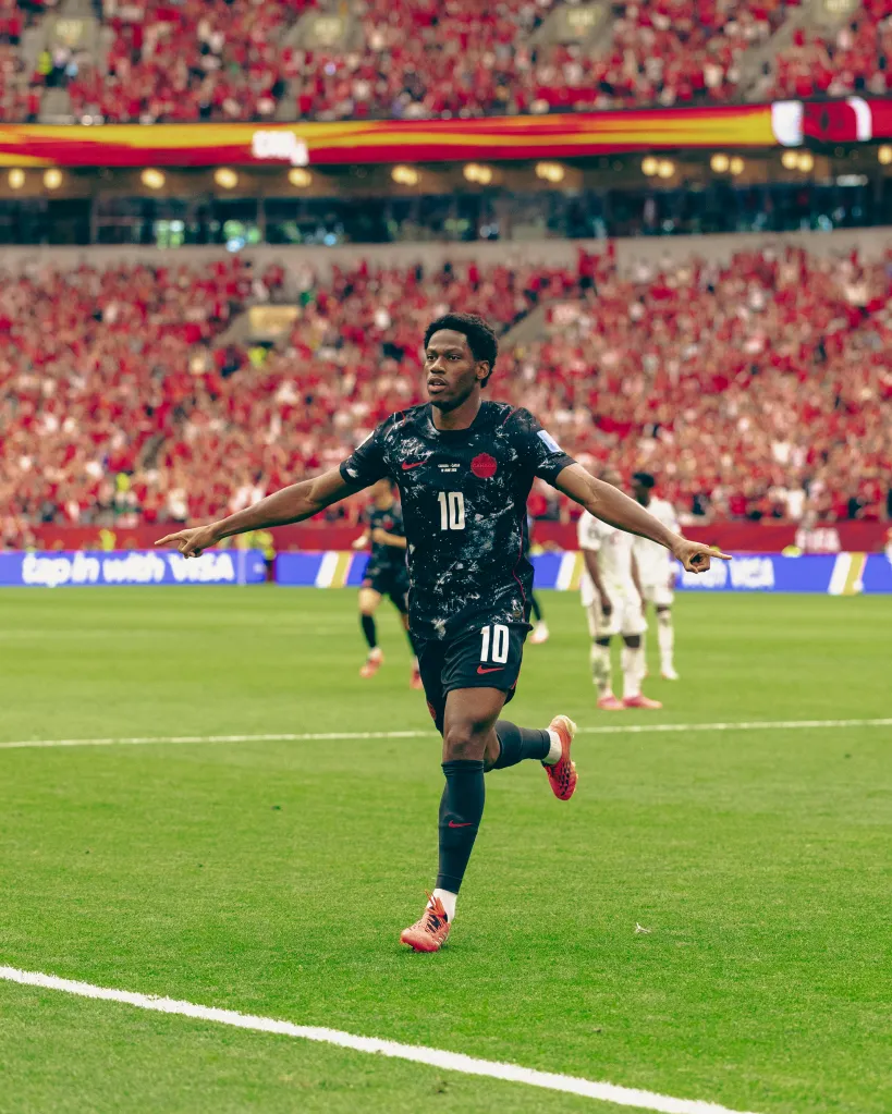 Jonathan David celebrates after scoring for Canada during the FIFA World Cup 2026 Group B match.