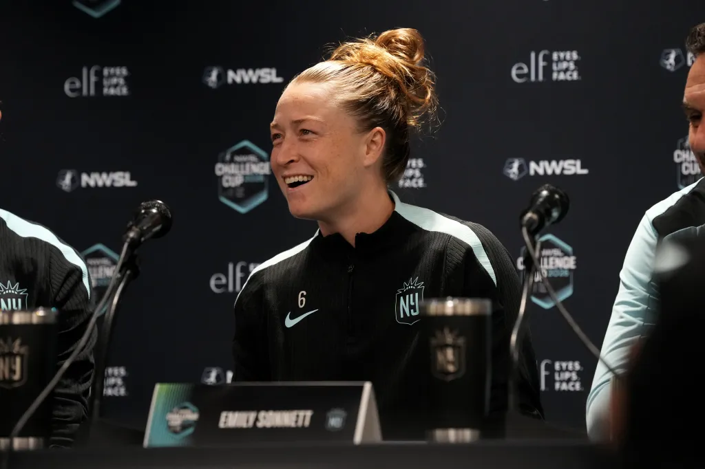 Emily Sonnett #6 of Gotham FC addresses the media at a press conference.