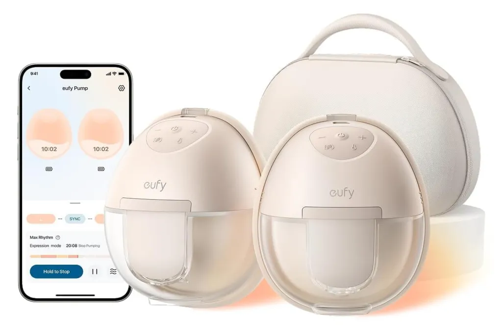 Two eufy Security Heated Wearable Breast Pump S1 Pro devices with a phone showing the companion app.