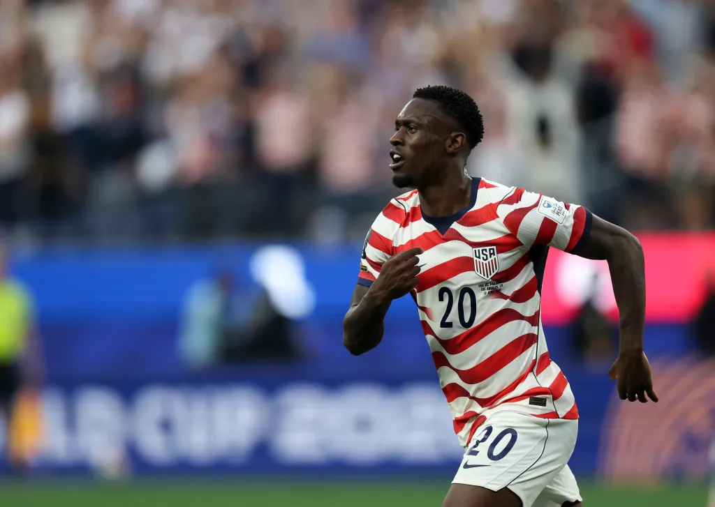 Folarin Balogun of the United States celebrates scoring a goal.
