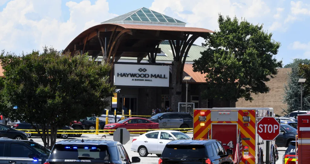 Police and emergency vehicles responding to reports of gunfire at Haywood Mall.