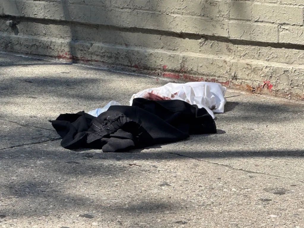 Matthew Bonilla, 26, was charged with attempted murder in connection to the gun battle that left a 79-year-old woman caught in the crossfire, authorities and law enforcement sources said.