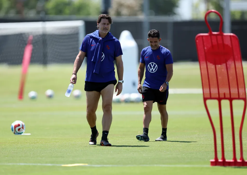 Head coach Mauricio Pochettino and assistant coach Jesus Perez watching a training session for the 2026 World Cup.