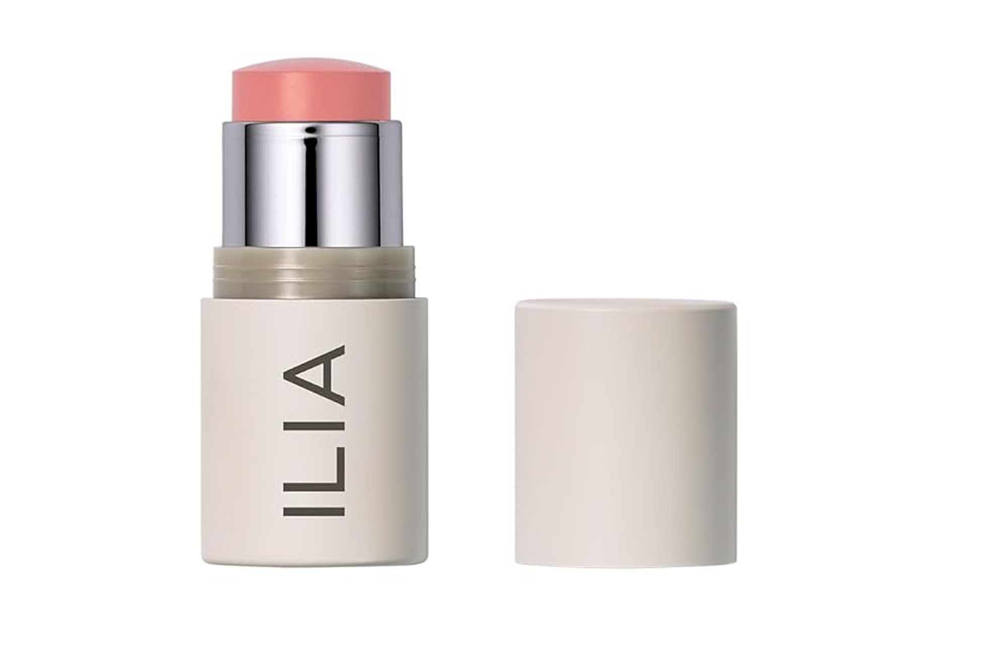 ILIA blush stick in a light peach shade.