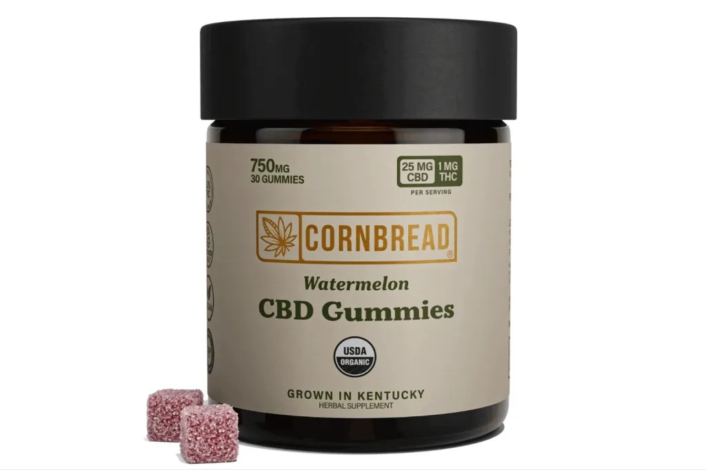 A jar of Cornbread Watermelon CBD Gummies with 750mg total CBD, 25mg CBD, and 1mg THC per serving, with two gummies shown next to the jar.