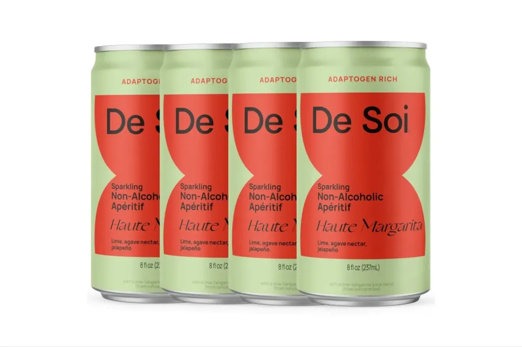 Four De Soi sparkling non-alcoholic aperitif cans in "Haute Margarita" flavor.