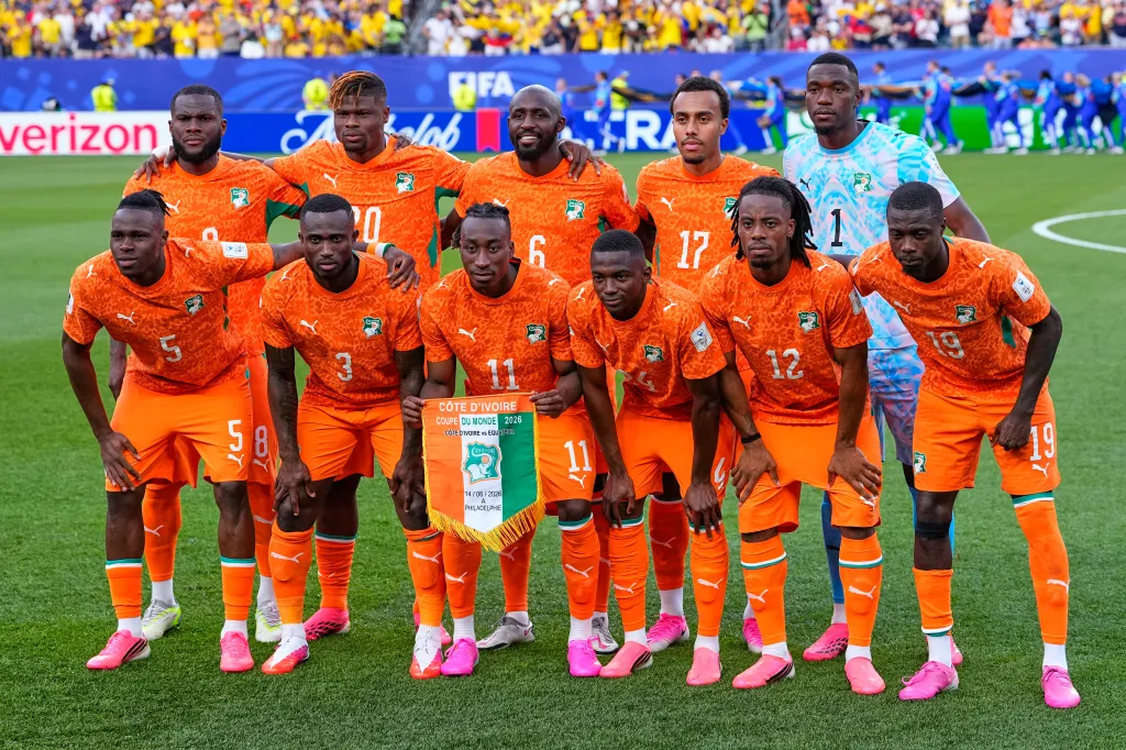 Ivory Coast players pose for a team photo ahead of their World Cup match against Ecuador.