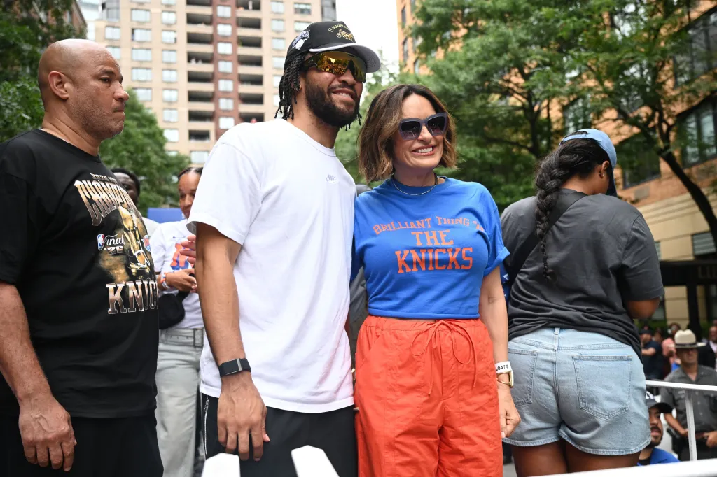Jalen Brunson and Mariska Hargitay attend the New York Knicks ticker-tape parade along the Canyon of Heroes on July 18, 2026 in New York City.