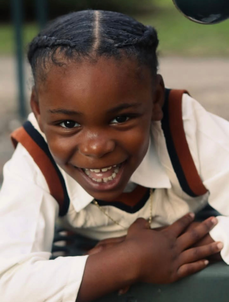 A close-up of Jayceon Gates smiling.