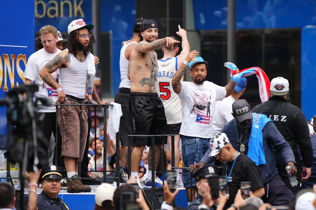New York Knicks' Jose Alvarado #5 during a championship parade.