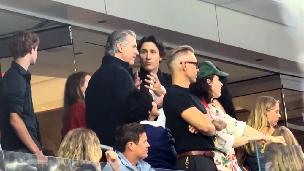 Justin Trudeau talking to Gavin Newsom at the World Cup in Los Angeles.