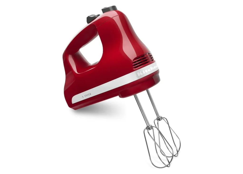 Red KitchenAid 5 Speed hand mixer with beaters.