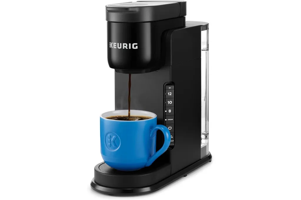 Keurig K-Slim + ICED Single Serve Coffee Maker dispensing coffee into a blue mug.