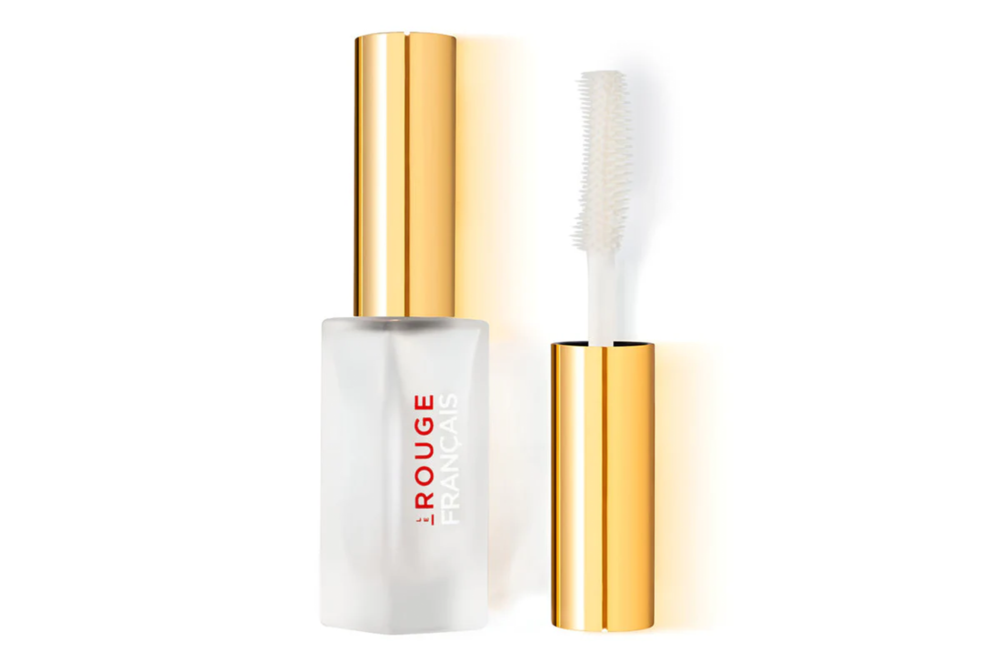 Le Rouge Français Lash Primer with its applicator brush extended.