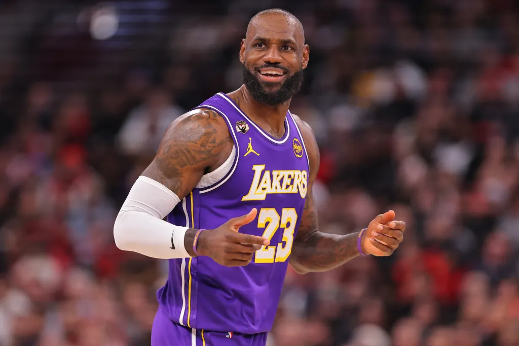 LeBron James #23 of the Los Angeles Lakers, smiling on the court.