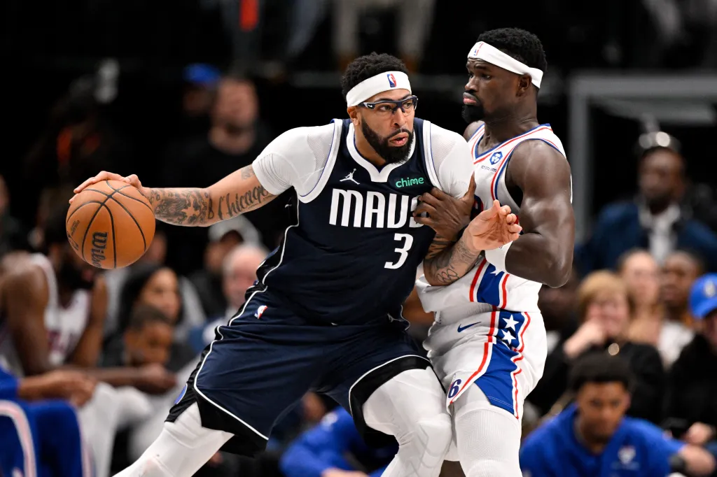 Dallas Mavericks forward Anthony Davis (3) with the ball being guarded by Philadelphia 76ers center Adem Bona (30).