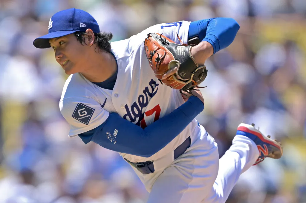 Los Angeles Dodgers pitcher Shohei Ohtani pitches in the fifth inning.