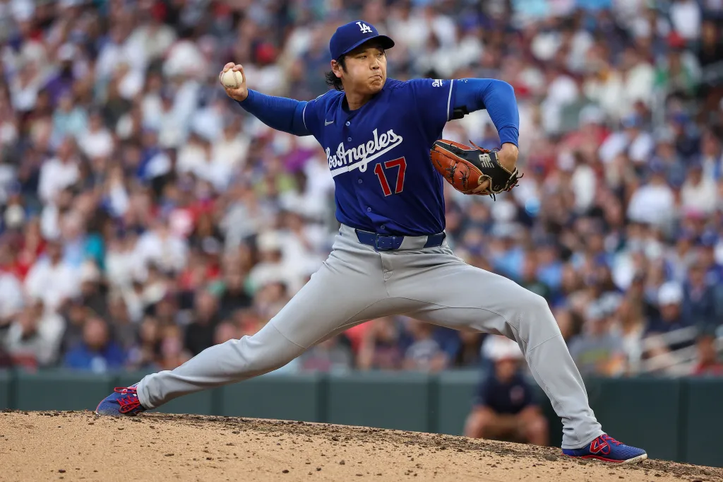 Shohei Ohtani pitching for the Dodgers against the Twins.