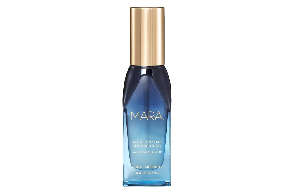 Mara Algae Enzyme Cleansing Oil in a blue bottle with a gold cap.