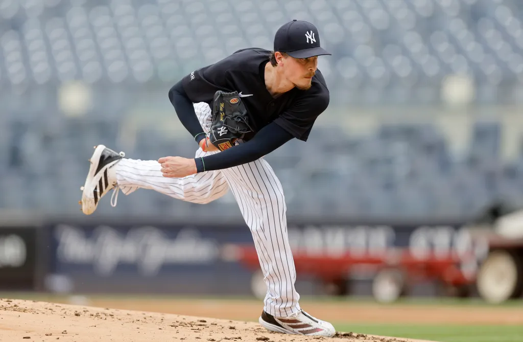 Max Fried #54 of the New York Yankees pitches during a live bullpen session.