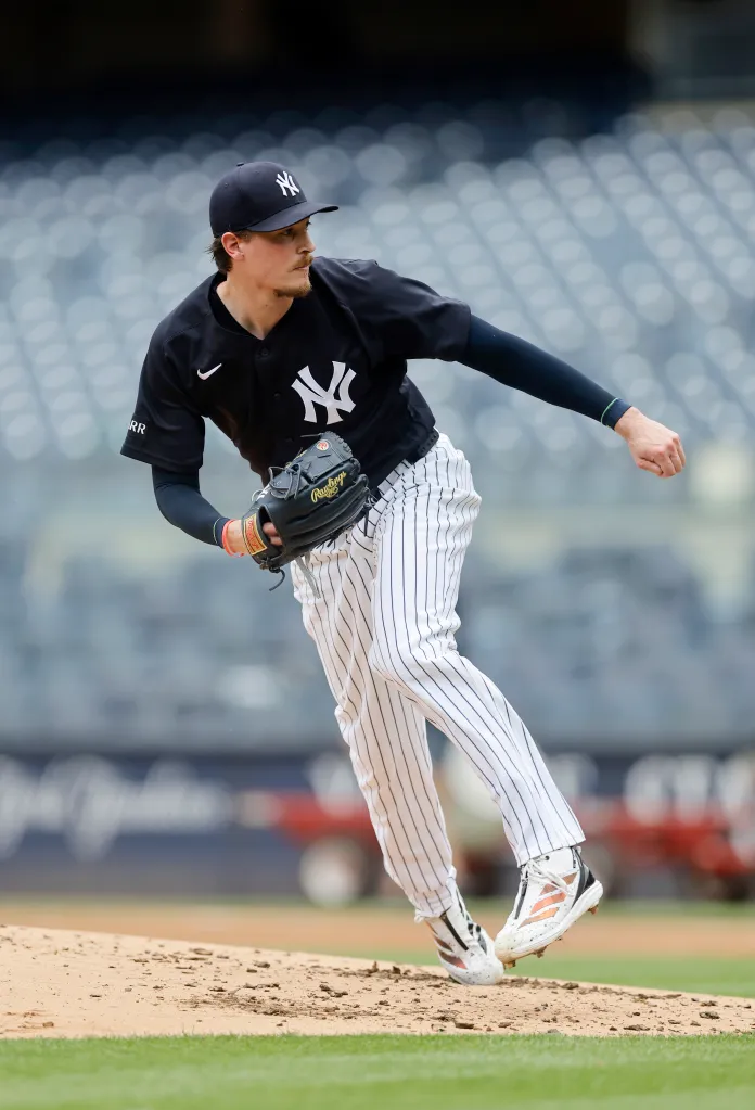 Max Fried of the New York Yankees throwing during a bullpen session.