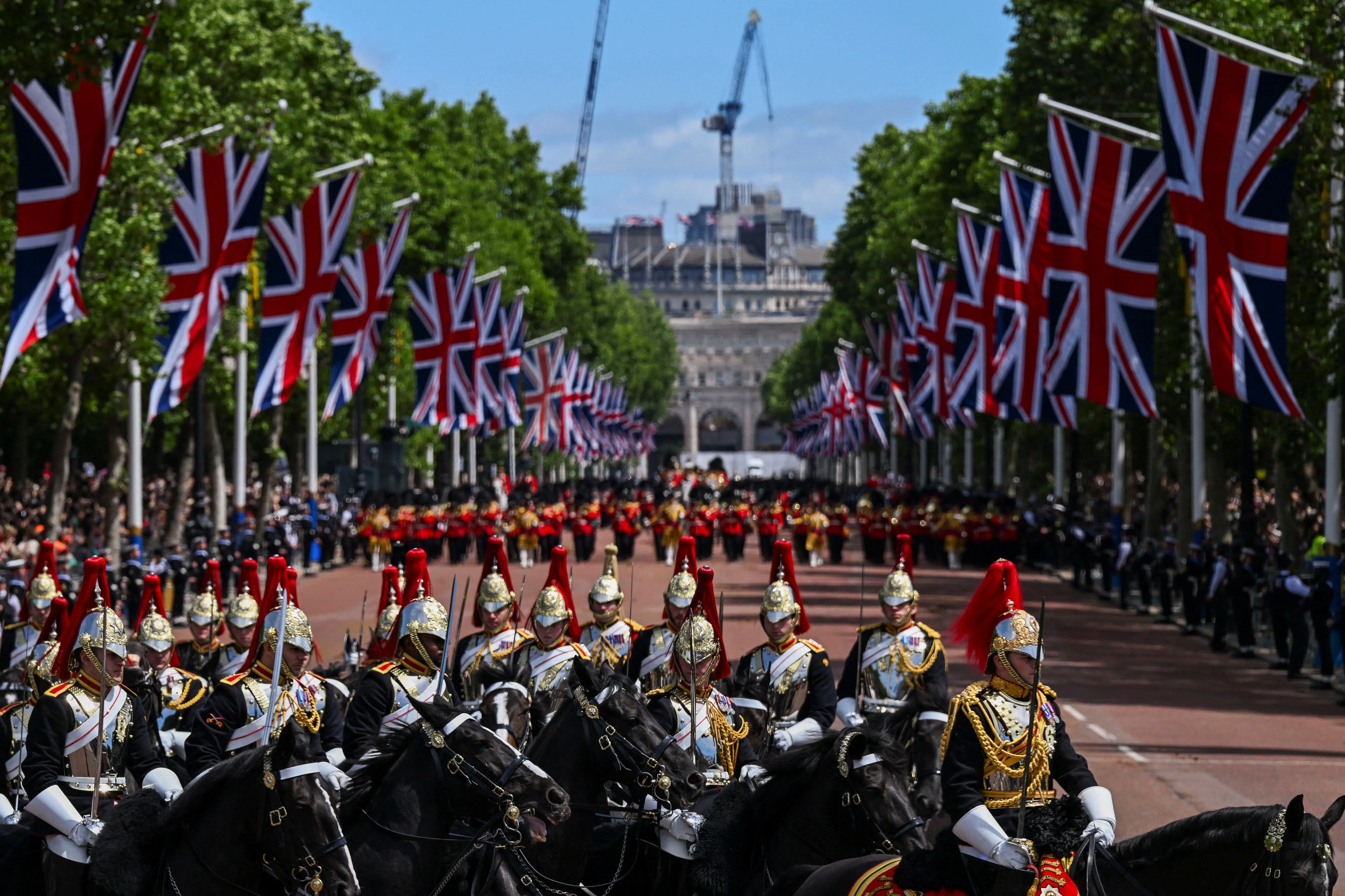 Members of the Household Division march along The Mall during the Trooping the Colour parade.