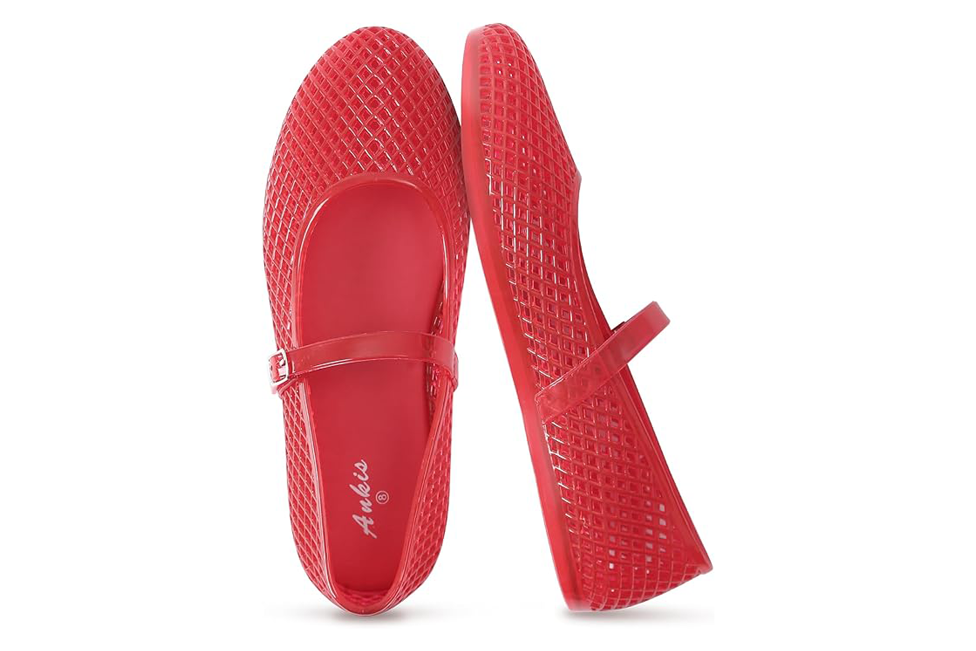 Pair of red mesh flat shoes, one lying on its side, the other upright.
