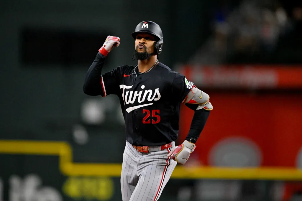 Minnesota Twins center fielder Byron Buxton (25) rounds the bases after hitting a home run.