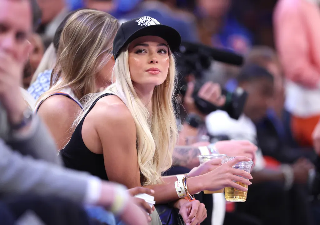 Influencer Livvy Dunne on celebrity row at Madison Square Garden.