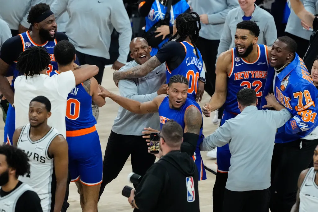 The New York Knicks celebrate after defeating the San Antonio Spurs in Game 5 of the NBA Finals.