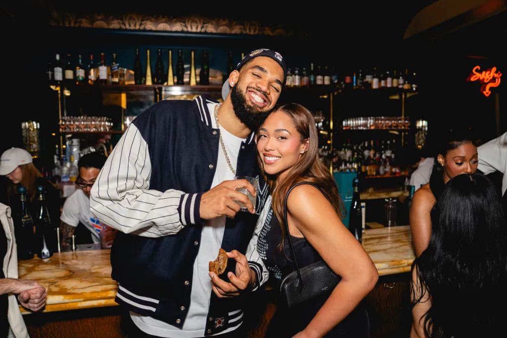 Karl-Anthony Towns and Jordyn Woods celebrate the New York Knicks' NBA Championship at Flyfish Club, the exclusive private members' club co-founded by Gary Vaynerchuk, David Rodolitz, Chef Josh Capon, and Chef Conor Hanlon, located in Manhattan on Sunday, June 14, 2026.