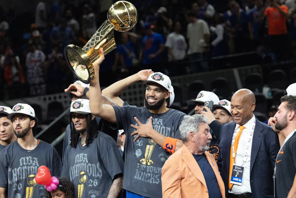 Karl-Anthony Towns celebrates the Knicks winning the NBA championship.