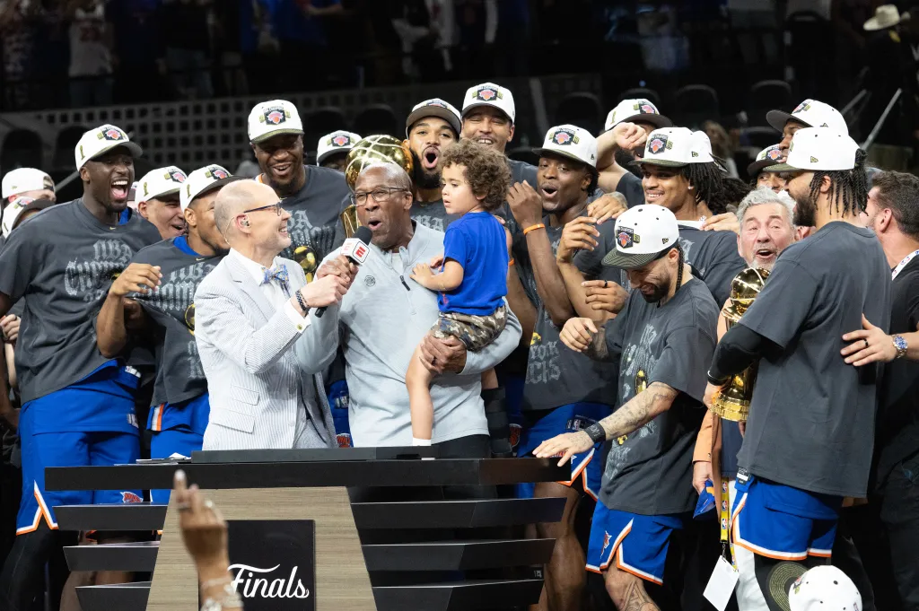 Mike Brown is interviewed by ESPN's Ernie Johnson during the Knicks' trophy ceremony on June 13, 2026.