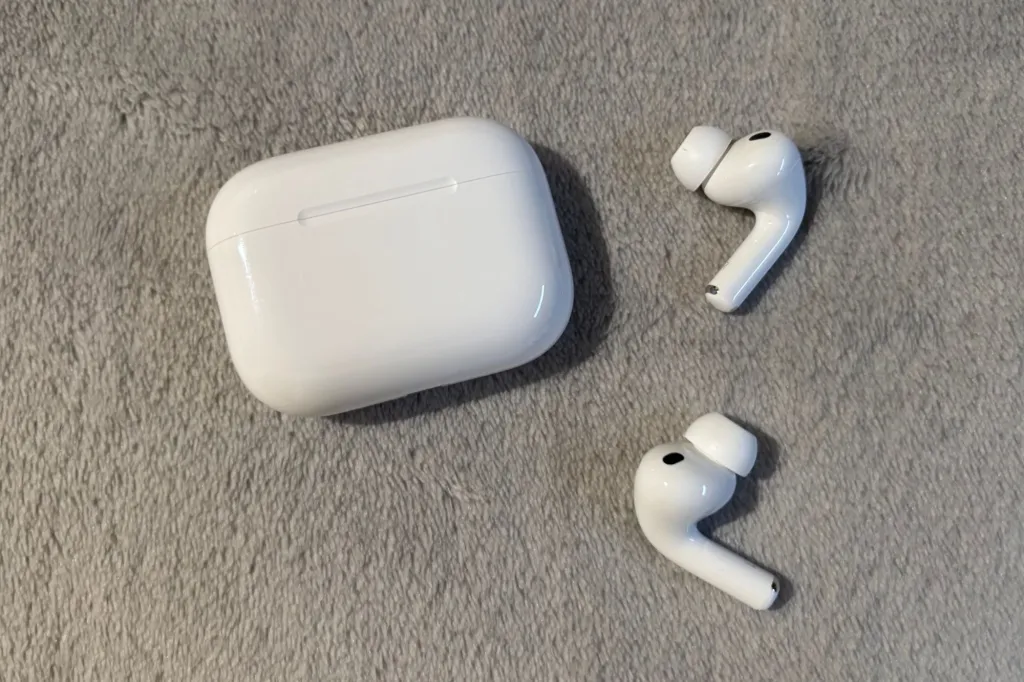 An image collage containing 1 images, Image 1 shows airpods pro 3 on a gray background