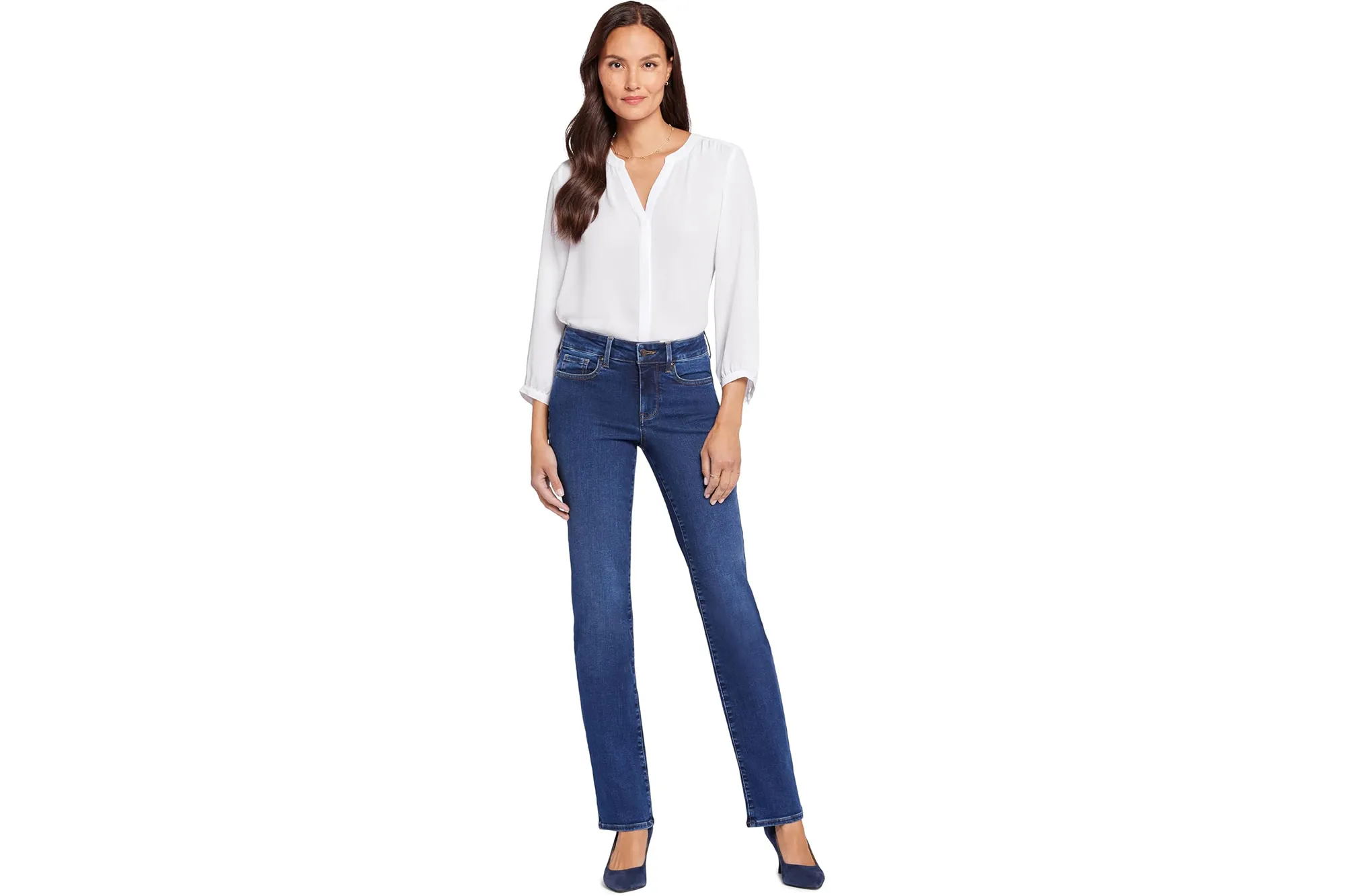 A model in a white shirt and NYDJ Marilyn Straight Leg Jeans