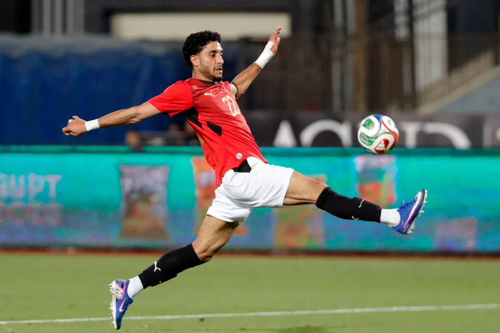 Omar Marmoush of Egypt kicking a soccer ball during a friendly match against Russia.