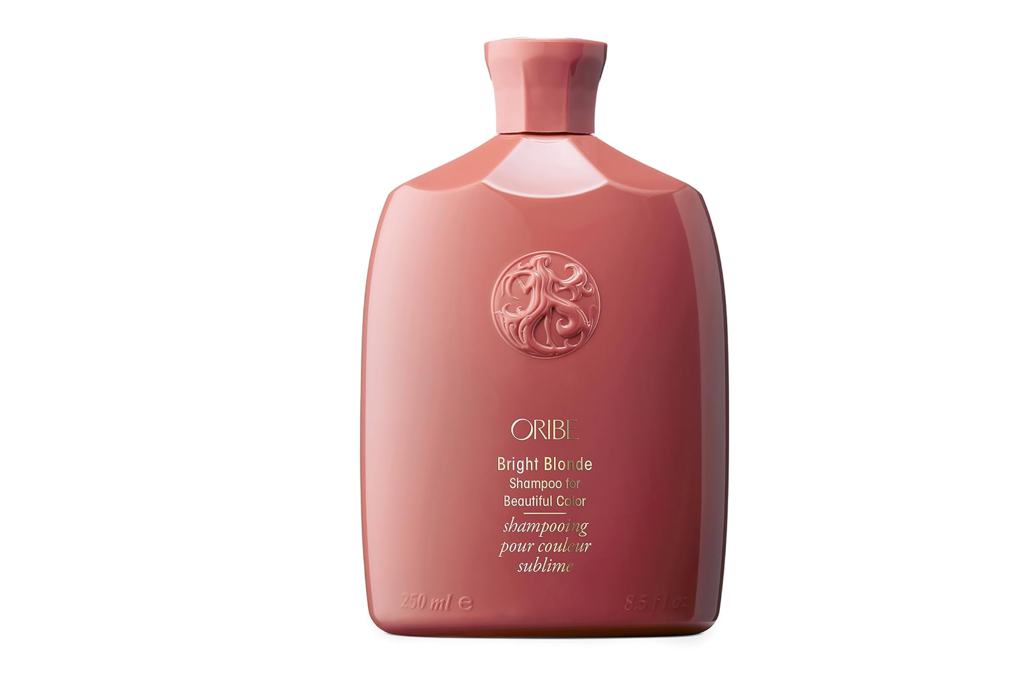 Oribe Bright Blonde Shampoo for Beautiful Color in a pink bottle.
