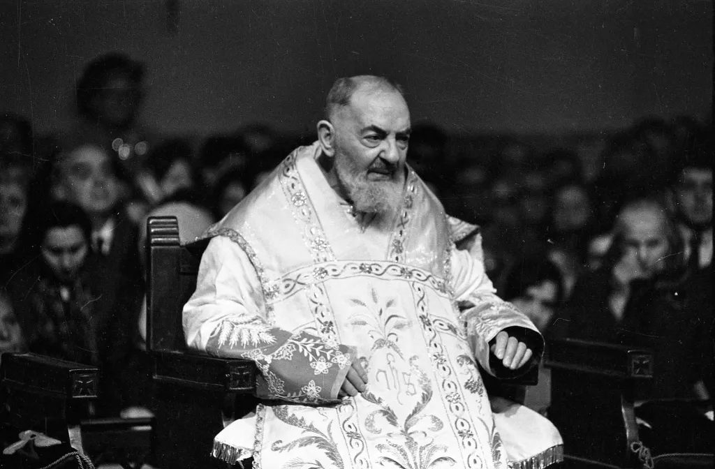 Padre Pio during the mass at the Sanctuary of Saint Pio of Pietrelcina.