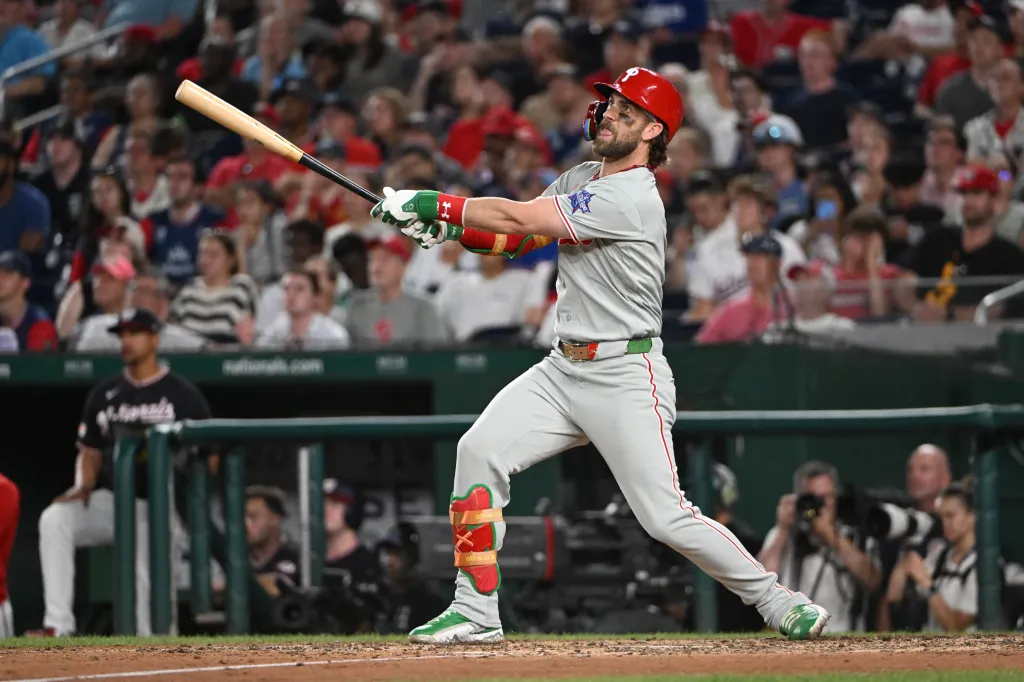 Philadelphia Phillies first baseman Bryce Harper in mid-swing.