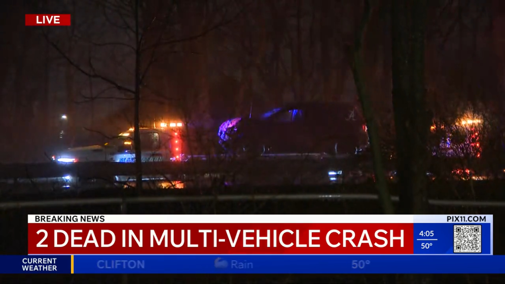 Multi-vehicle crash at night with emergency vehicle lights flashing and "2 DEAD IN MULTI-VEHICLE CRASH" headline.