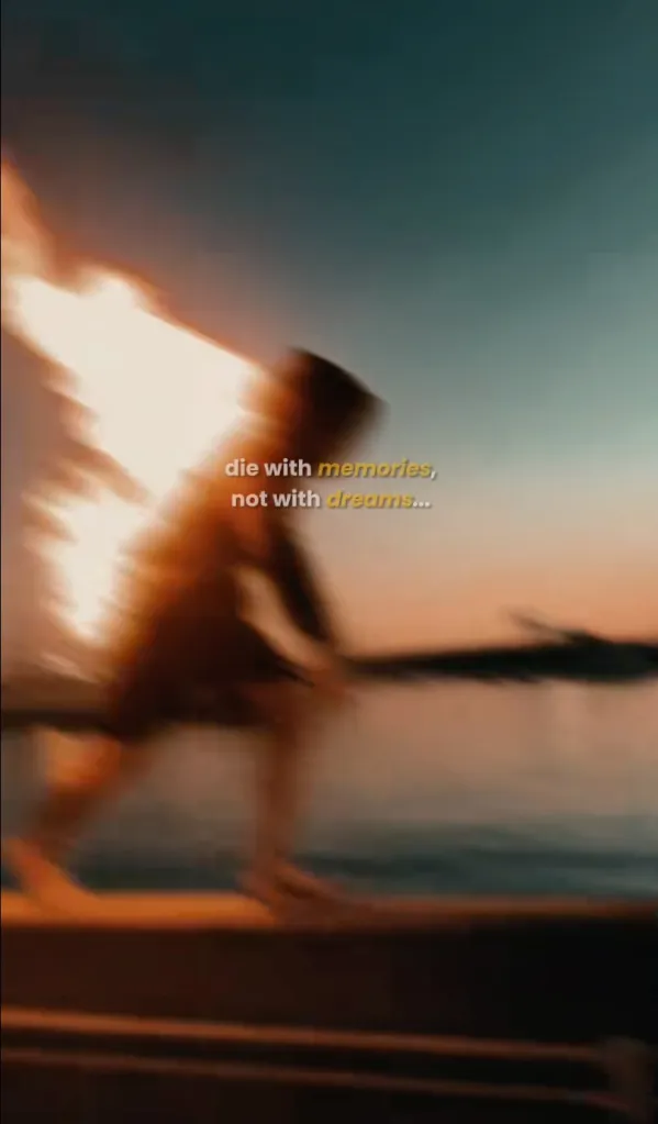 A blurred image shows a person on fire about to jump into water, with the text "die with memories, not with dreams..."