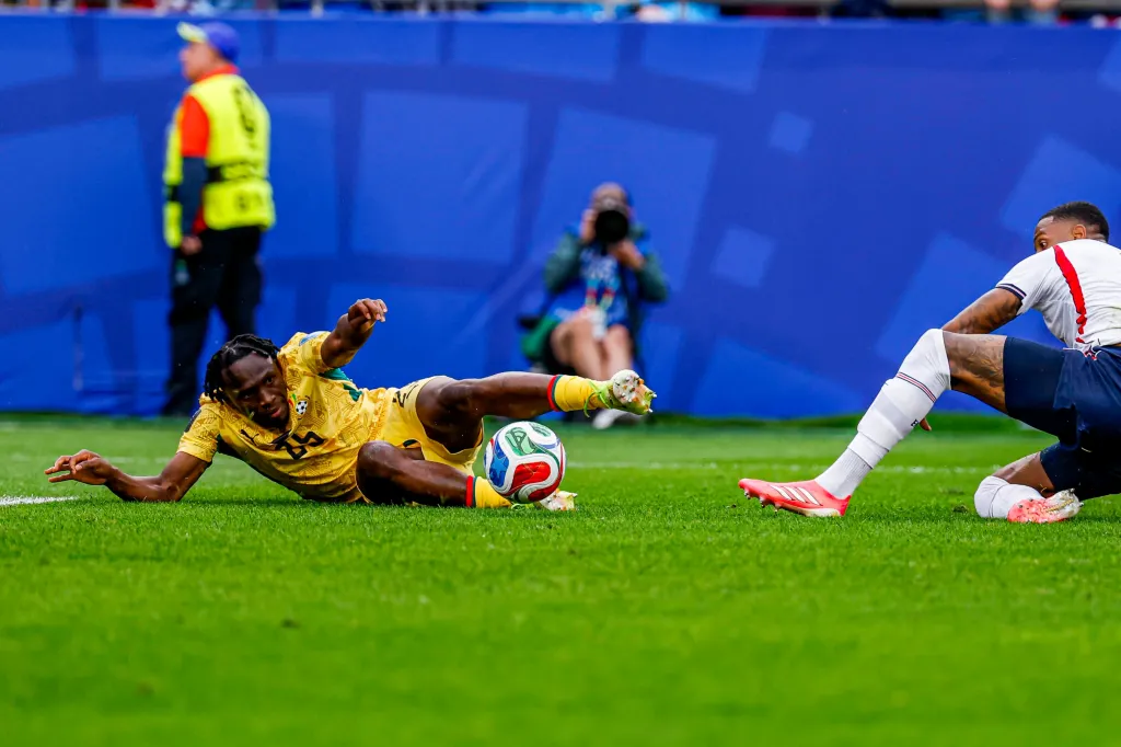 Ghana's Prince Kwabena Adu and England's Ezri Konsa battle for the ball during the FIFA World Cup 2026.