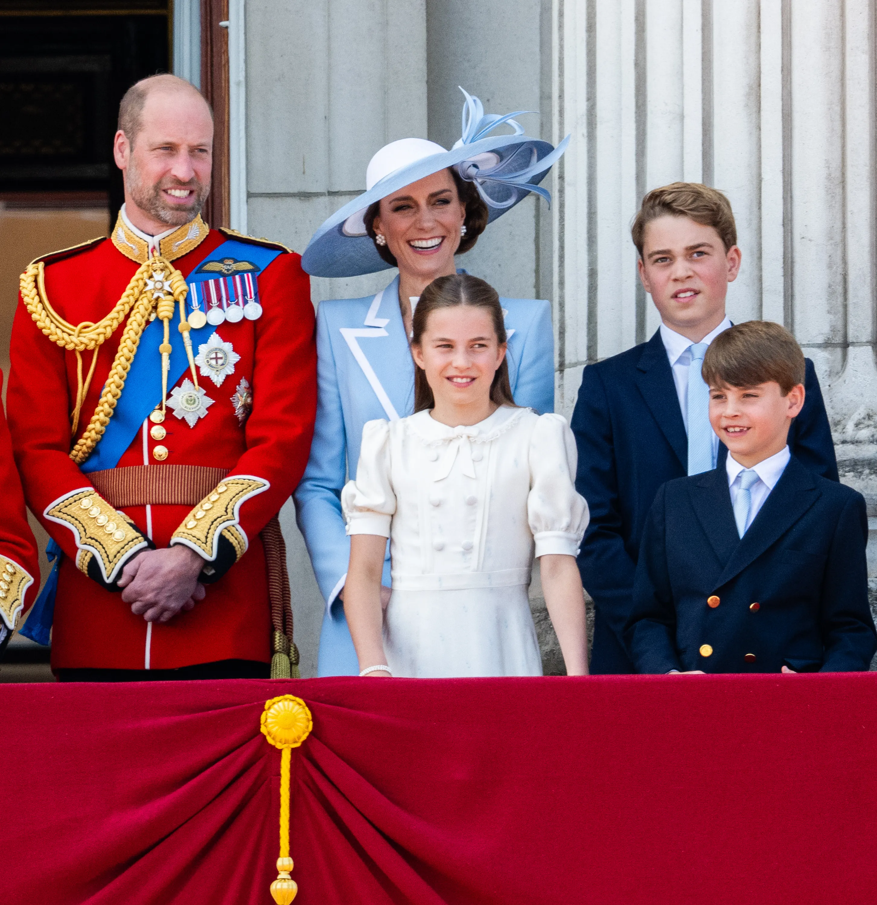 Prince William, Prince of Wales, Princess Charlotte of Wales, Catherine, Princess of Wales, Prince George of Wales and Prince Louis of Wales watch an RAF flypast from the balcony of Buckingham Palace during Trooping The Colour.