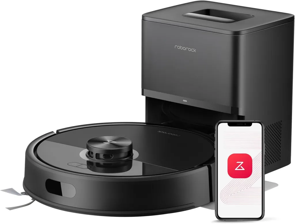 Black Roborock robot vacuum and docking station with a smartphone displaying the Roborock app.