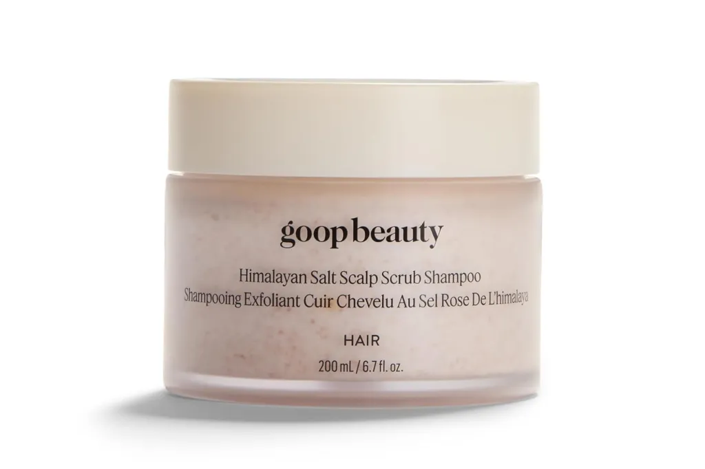 A container of Goop Beauty Himalayan Salt Scalp Scrub Shampoo.